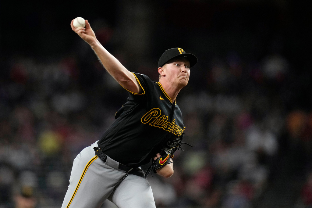 Pittsburgh Pirates starting pitcher Mitch Keller throws against the Arizona Diamondbacks during the first inning of a baseball game, Thursday, May 7, 2026, in Phoenix. (AP Photo/Ross D. Franklin)