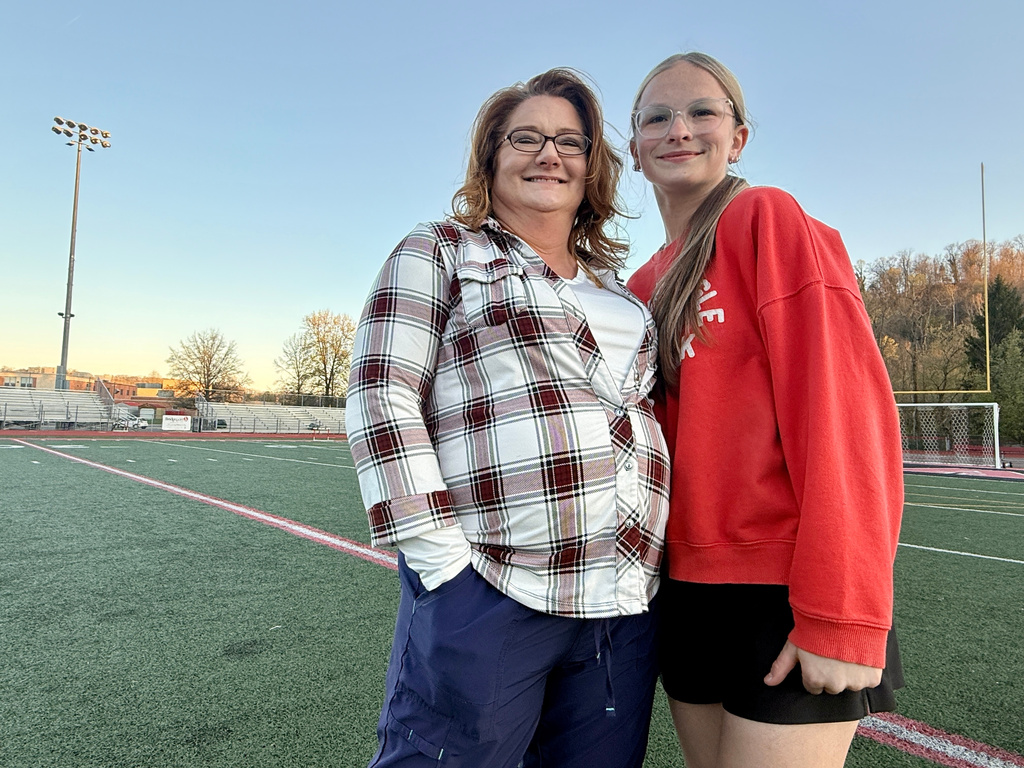 Heather Jackson, left, and her daughter, Becky Pepper-Jackson, pose for a portrait Tuesday, April 7, 2026, at Bridgeport High School in Bridgeport, W.Va. (AP Photo/John Raby)
