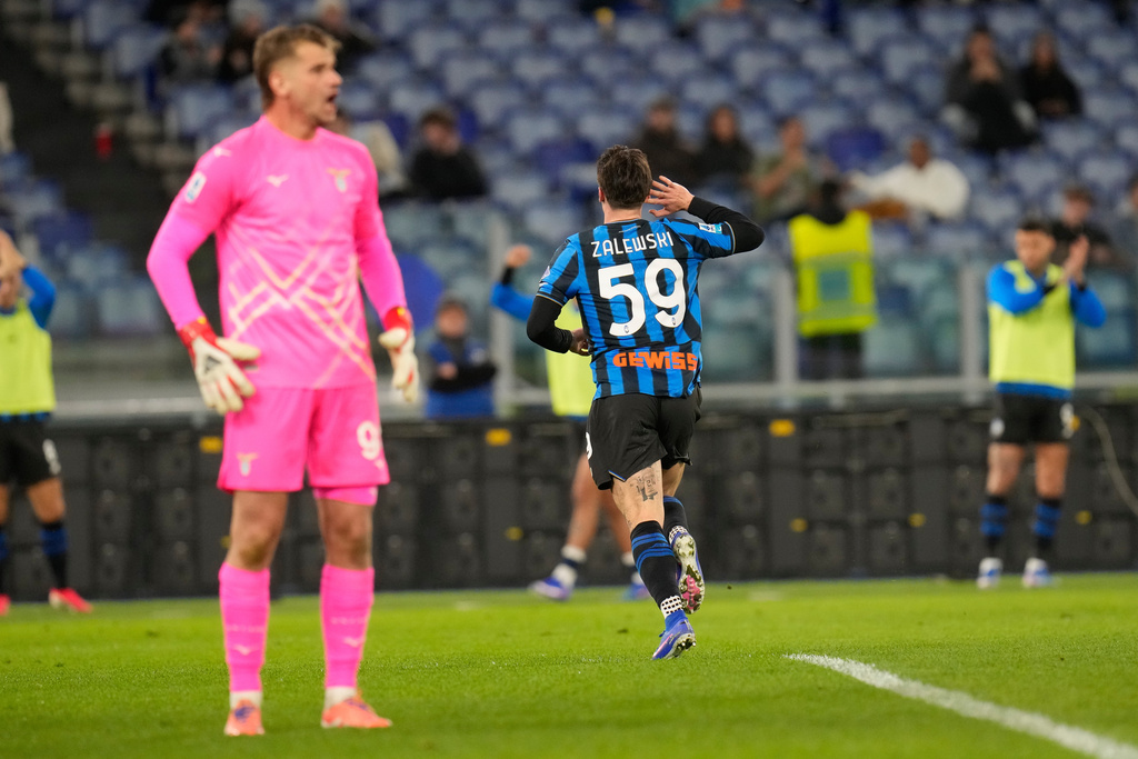 Atalanta's Nicola Zalewski celebrates after scoring his side's second goal during the Serie A soccer match between Lazio and Atalanta in Rome, Saturday, Feb. 14, 2026. (AP Photo/Gregorio Borgia)