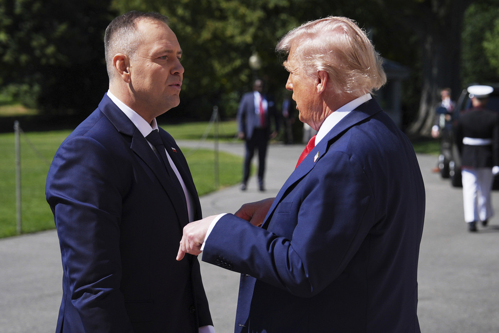 President Donald Trump greets Polish President Karol Nawrocki at the White House, Wednesday, Sept. 3, 2025, in Washington. (AP Photo/Evan Vucci)