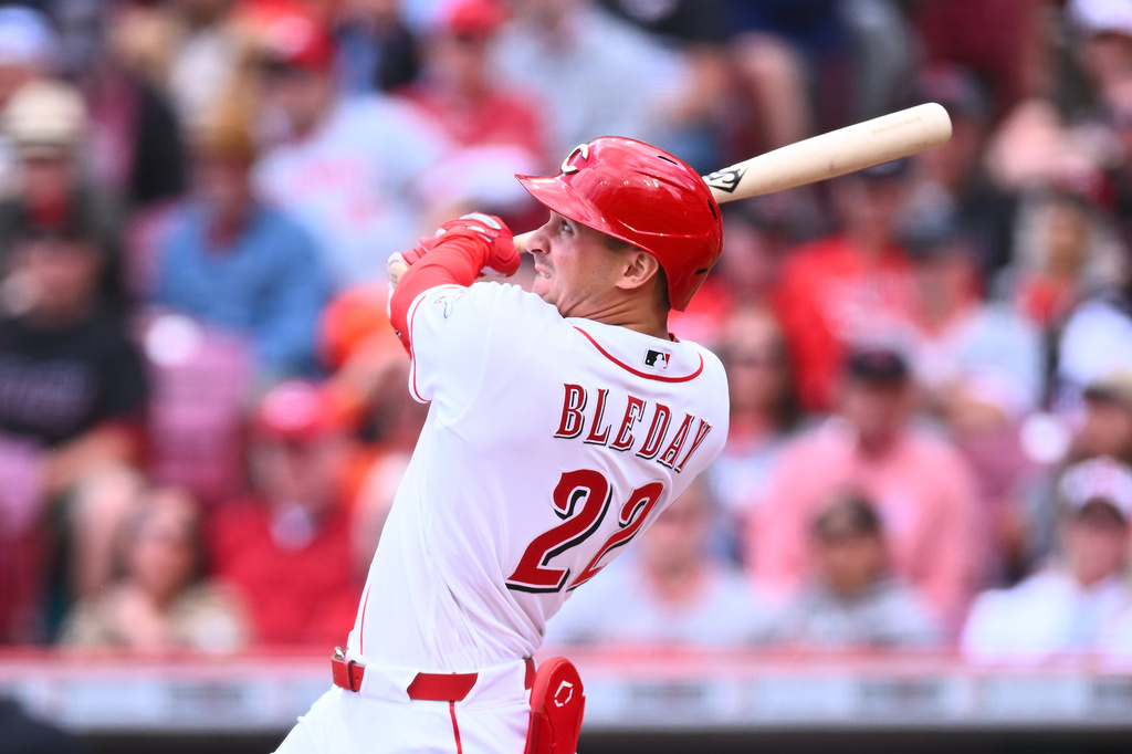 Cincinnati Reds' JJ Bleday (22) hits a three-run home run during the fifth inning of a baseball game against the Washington Nationals in Cincinnati, Thursday, May 14, 2026. (AP Photo/Ben Jackson)