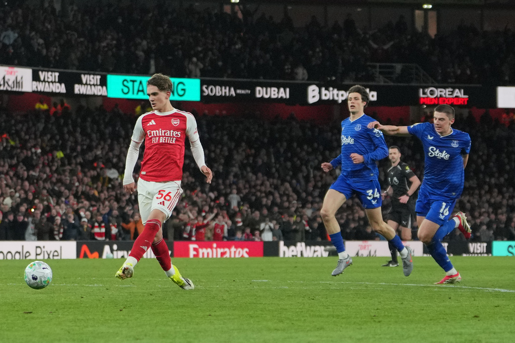 Arsenal's Max Dowman scores during the English Premier League soccer match between Arsenal and Everton in London, England, Saturday, March 14, 2026. (AP Photo/Kin Cheung)