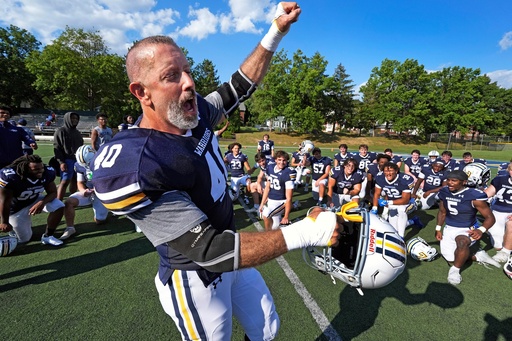 After seeing his first college football game action, Lycoming College nose tackle Tom Cillo (40) and teammates celebrate a 23-16 win over King's College in an NCAA Division III junior varsity college football game in Williamsport, Pa., Sunday, Sept. 28, 2025. (AP Photo/Gene J. Puskar) After seeing his first college football game action, Lycoming College nose tackle Tom Cillo (40) and teammates celebrate a 23-16 win over King's College in an NCAA Division III junior varsity college football game in Williamsport, Pa., Sunday, Sept. 28, 2025. (AP Photo/Gene J. Puskar)