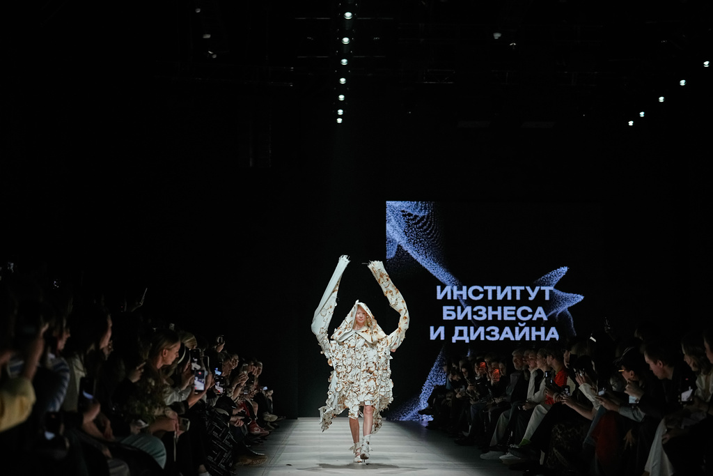 A model wears a creation by students of the Russian Institute of Business and Design B&D on a runway at the Moscow Fashion Week in Moscow, on Thursday, March 19, 2026. (AP Photo/Alexander Zemlianichenko)