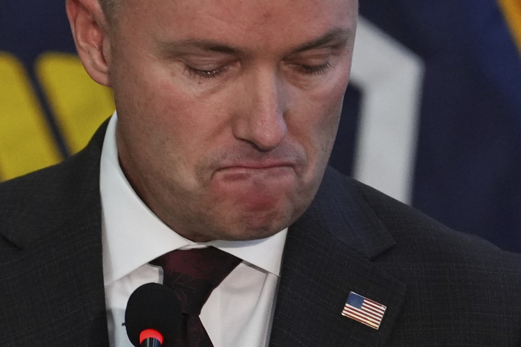 Utah Gov. Spencer Cox pauses as he speaks at a news conference, Friday, Sept. 12, 2025, in Orem, Utah. (AP Photo/Lindsay Wasson)
