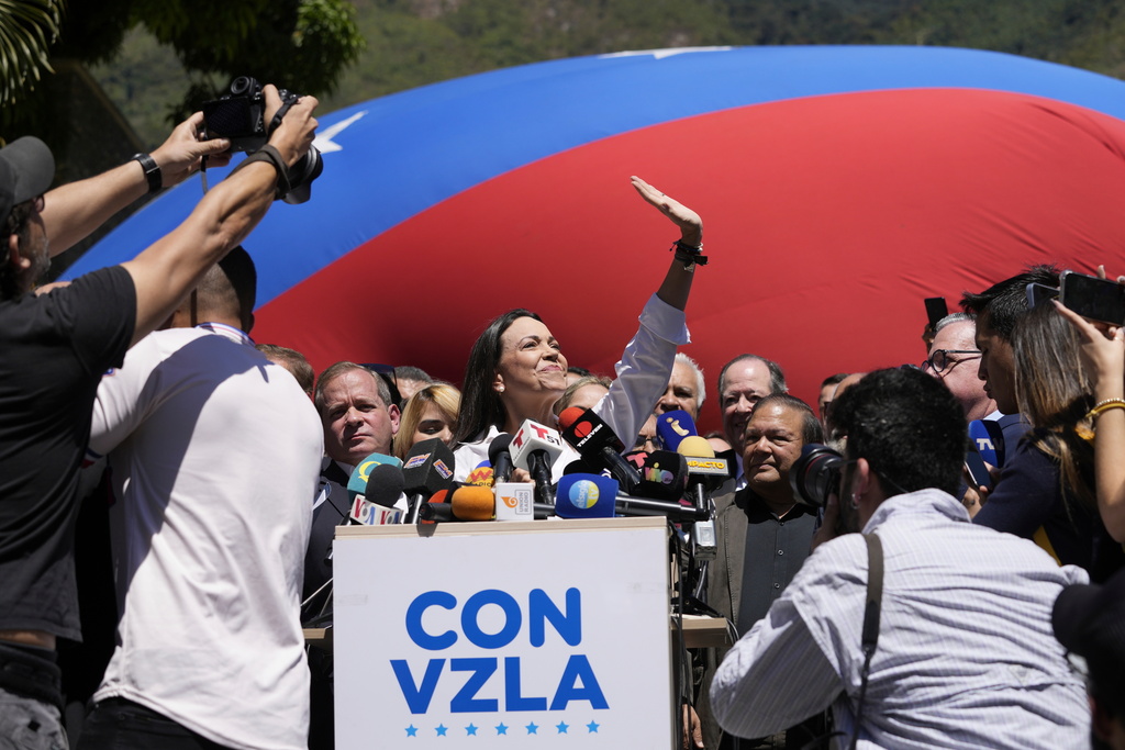 FILE - Opposition coalition presidential hopeful Maria Corina Machado gives a press conference outside her campaign headquarters in Caracas, Venezuela, Monday, Jan. 29, 2024, days after the country's highest court upheld a ban on her presidential candidacy. (AP Photo/Ariana Cubillos, File)