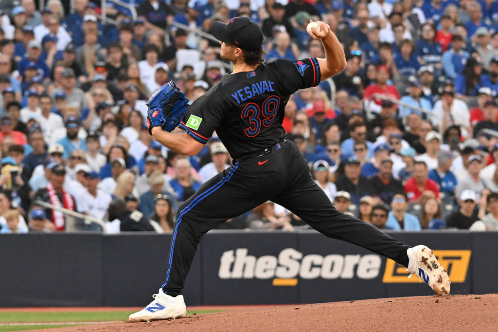 Toronto Blue Jays pitcher Trey Yesavage (39) throws to a New York Yankees batter during first inning of a baseball game in Toronto on Friday, June 12, 2026. (Jon Blacker/The Canadian Press via AP)