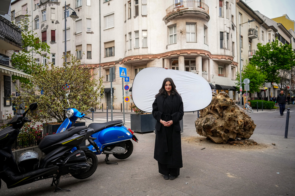 Sara Karpati, 21, poses for a portrait in Budapest, Hungary, Monday, April 13, 2026. "Every four years, a new generation gets to vote, and each one is less likely to blindly trust what they're told." (AP Photo/Petr David Josek)