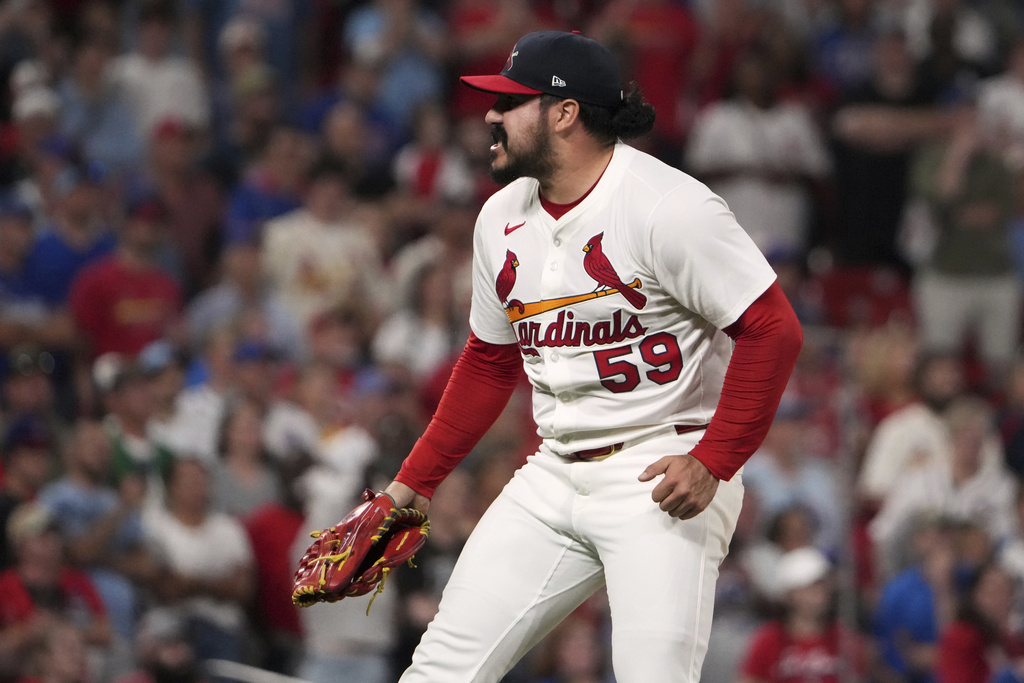 St. Louis Cardinals relief pitcher JoJo Romero celebrates after getting Chicago Cubs' Matt Shaw to ground into a force out ending a baseball game Sunday, Aug. 10, 2025, in St. Louis. (AP Photo/Jeff Roberson)
