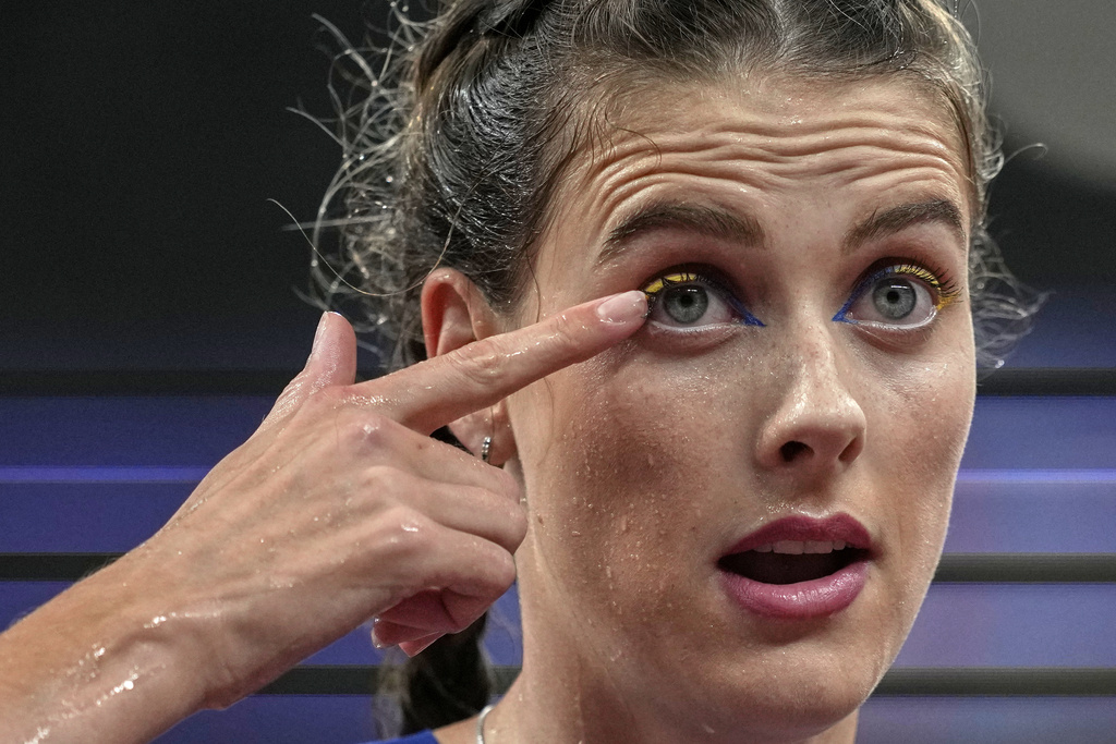 Ukraine's Yaroslava Mahuchikh gestures in the women's high jump final at the World Athletics Championships in Tokyo, Sunday, Sept. 21, 2025. (AP Photo/Louise Delmotte)