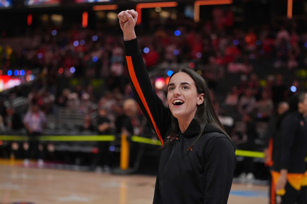 FILE - Indiana Fever's Caitlin Clark reacts to fans before the WNBA All-Star basketball game, Saturday, July 19, 2025, in Indianapolis. (AP Photo/Michael Conroy, file)