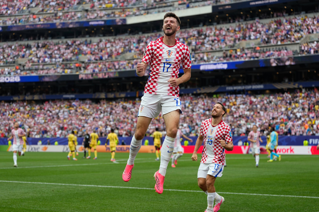 Croatia's Petar Sucic (17) celebrates after scoring his side's opening goalbduring the World Cup Group L soccer match between Croatia and Ghana in Philadelphia, Saturday, June 27, 2026. (AP Photo/Matt Slocum)
