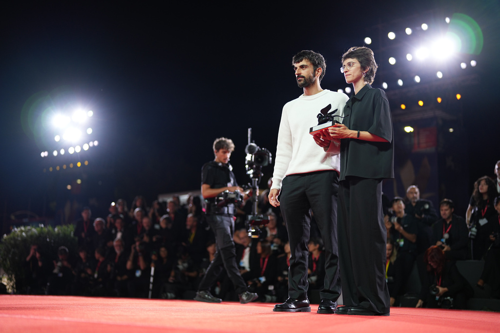 Directors Rachel Szor, left, and Yuval Abraham, winners of the special jury prize for the film 'Naza', pose for photographers at the awards photo call during the closing ceremony of the 83rd edition of the Venice Film Festival in Venice, Italy, on Saturday, Sept. 12, 2026. (Photo by Scott A Garfitt/Invision/AP)