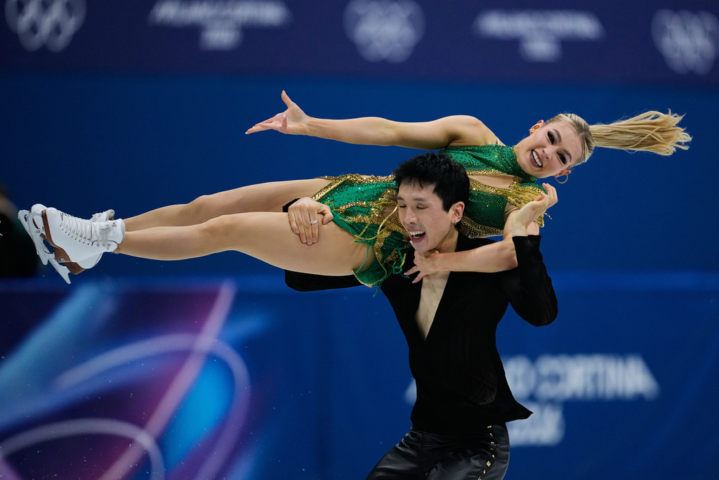Holly Harris and Jason Chan of Australia compete during the rhythm dance in figure skating at the 2026 Winter Olympics, in Milan, Italy, Monday, Feb. 9, 2026. (AP Photo/Ashley Landis)