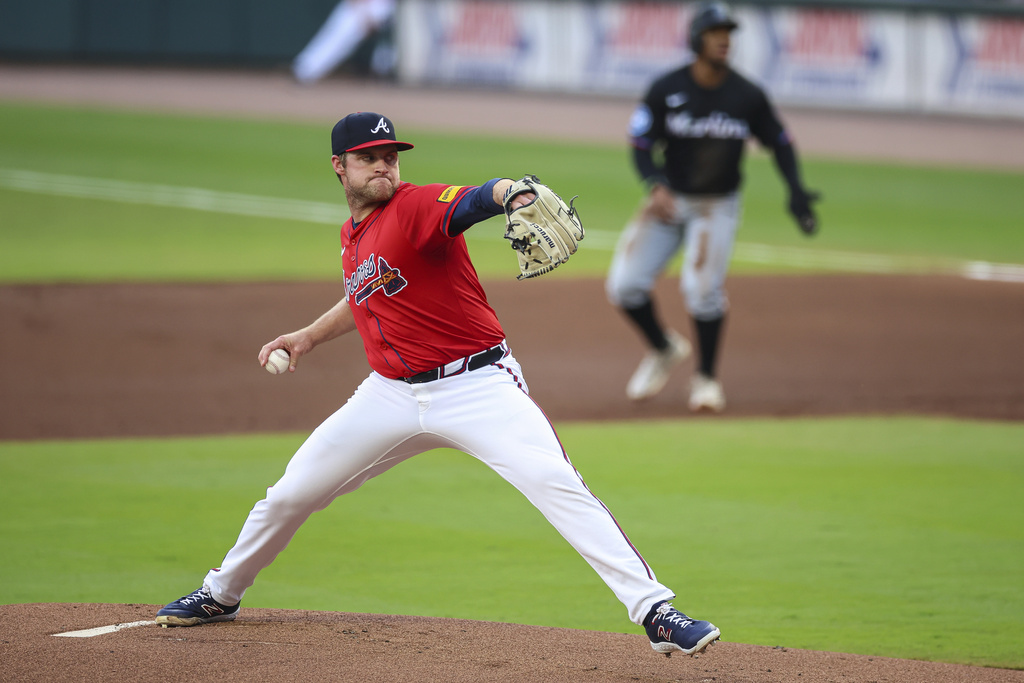 Atlanta Braves pitcher Bryce Elder delivers in the first inning of a baseball game against the Miami Marlins, Friday, Aug. 8, 2025, in Atlanta. (AP Photo/Colin Hubbard)