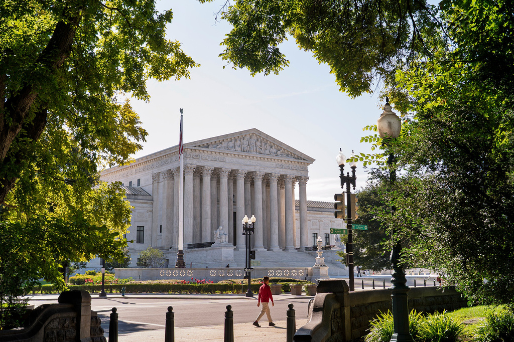 FILE - The Supreme Court is seen on the morning after the conservative majority sided with the Trump administration in a case over President Donald Trump's executive order restricting mail-in voting, on Capitol Hill in Washington, Tuesday, Aug. 25, 2026. (AP Photo/J. Scott Applewhite, File)