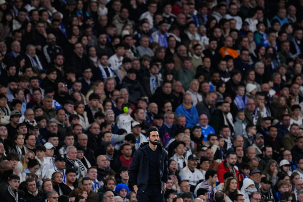 Real Madrid's head coach Alvaro Arbeloa stands on the sideline during the Spanish La Liga soccer match between Real Madrid and Real Sociedad in Madrid, Spain, Saturday, Feb. 14, 2026. (AP Photo/Manu Fernandez)