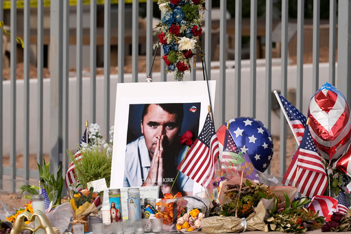 FILE - A makeshift memorial grows in size at the Turning Point USA headquarters after the shooting death at a Utah college of Charlie Kirk, the 31-year-old founder and CEO of the organization, Sept. 17, 2025, in Phoenix. (AP Photo/Ross D. Franklin, File) FILE - A makeshift memorial grows in size at the Turning Point USA headquarters after the shooting death at a Utah college of Charlie Kirk, the 31-year-old founder and CEO of the organization, Sept. 17, 2025, in Phoenix. (AP Photo/Ross D. Franklin, File)