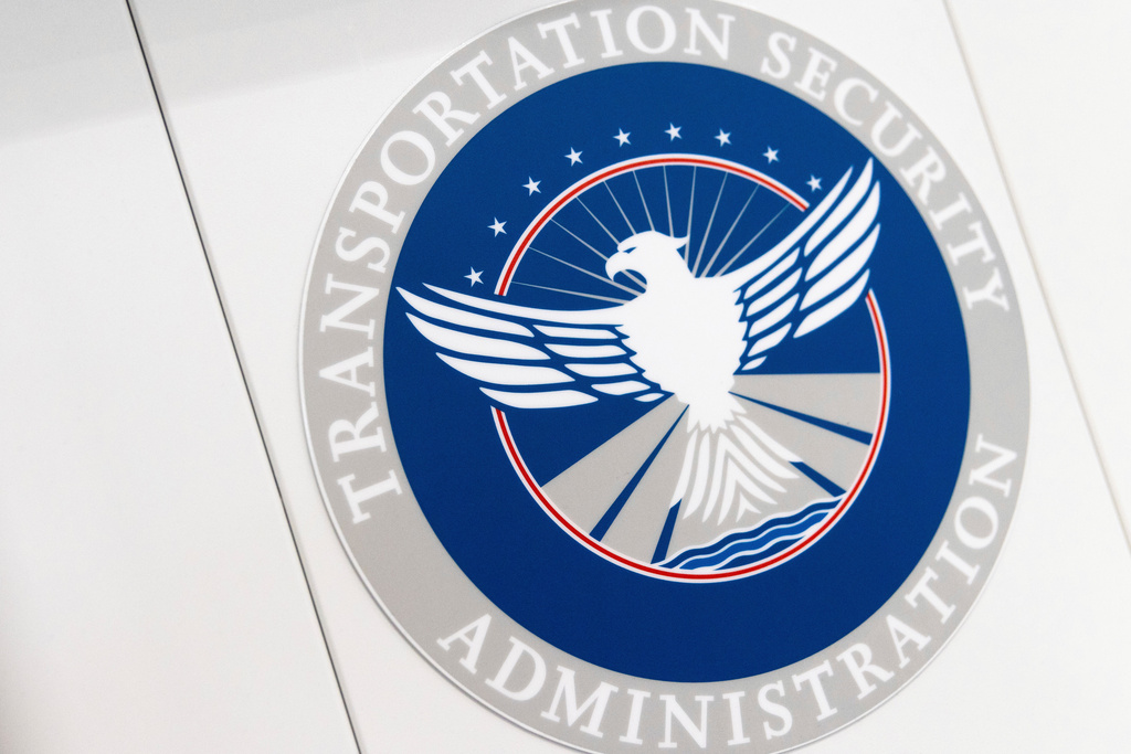 FILE - A Transportation Security Administration sign at a Baltimore-Washington International Thurgood Marshall Airport security checkpoint, Wednesday, April 26, 2023, in Glen Burnie, Md. (AP Photo/Julia Nikhinson, File)