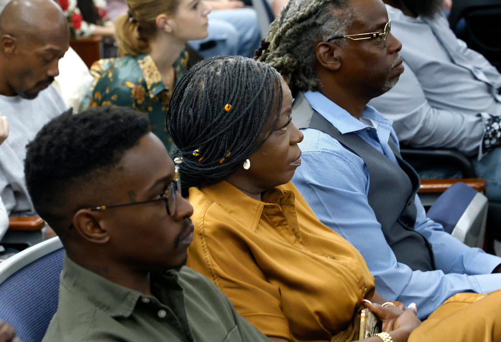 Family members of rapper Tupac Shakur, including his sister, Sekyiwa Shakur, center, attend the murder trial of Duane Davis, related to the 1996 killing of Tupac Shakur, in Clark County District Court at the Regional Justice Center in Las Vegas on Friday, Aug. 21, 2026. (Bizuayehu Tesfaye/Las Vegas Review-Journal via AP, Pool) CORRECTION: Date is 21, not 20.