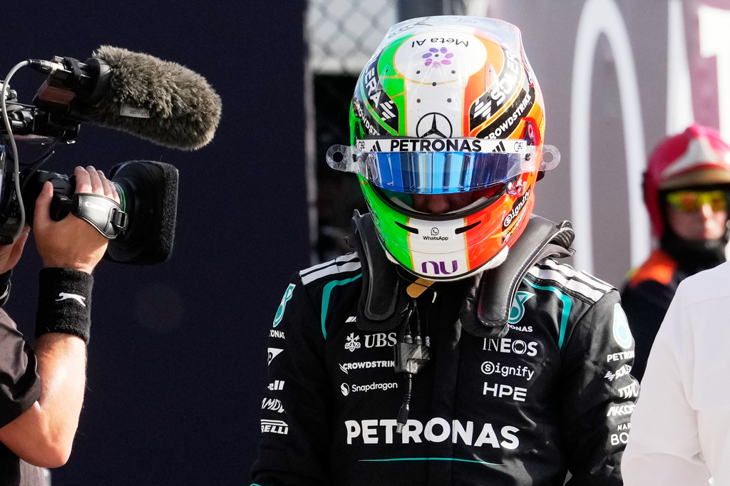 Mercedes driver Andrea Kimi Antonelli of Italy walks through the pits after the qualifying session ahead of the Italian Formula One Grand Prix, in Monza, Italy, Saturday, Sept. 5, 2026. (AP Photo/Luca Bruno)