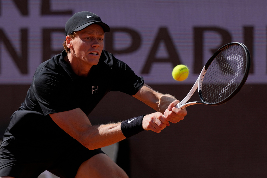 Italy's Jannik Sinner returns a ball to Daniil Medvedev of Russia during their semifinal match at the Italian Open tennis tournament in Rome, Saturday, May 16, 2026. (AP Photo/Alessandra Tarantino)