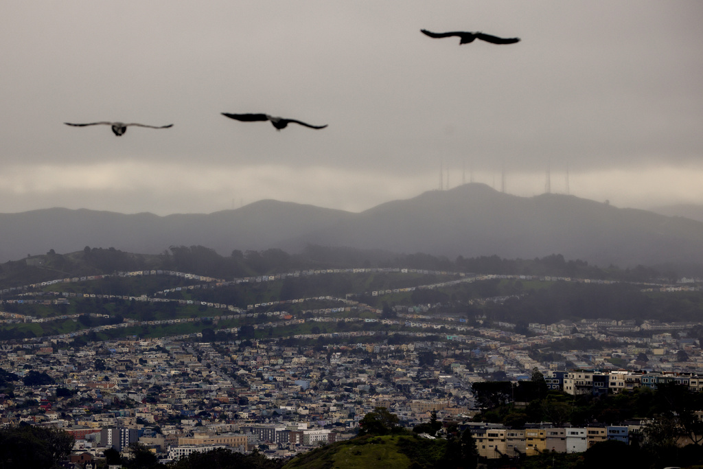 Storm clouds bring rain to the Bay Area, in San Francisco, Sunday, Feb. 15, 2026. (Brontë Wittpenn/San Francisco Chronicle via AP)