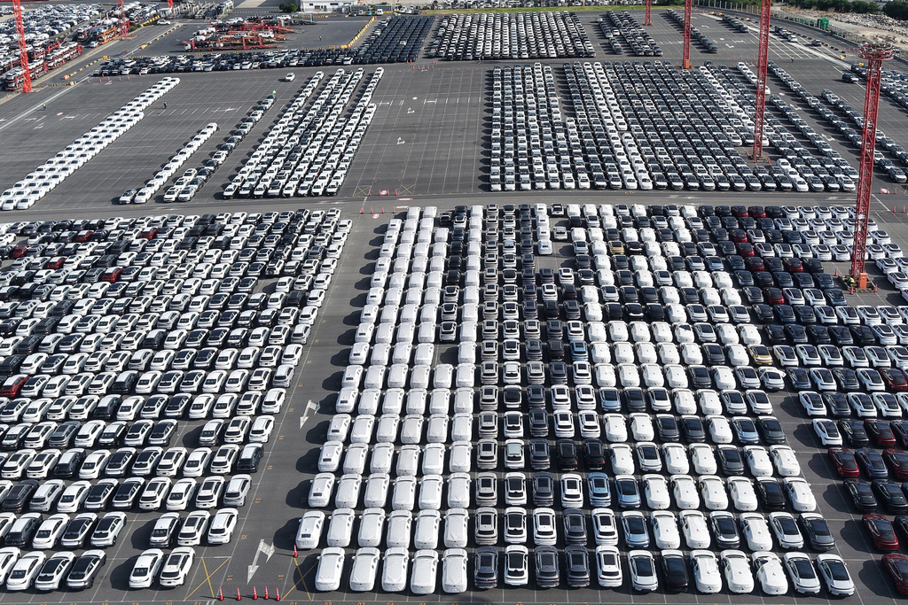 Aerial view of new cars waiting for shipment at a port in Shanghai, China, Wednesday, Jan. 14, 2026. (Chinatopix Via AP)
