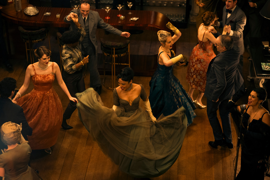 This image released by Amazon Prime shows Tessa Thompson, center, in a scene from "Hedda." (Matt Towers/Amazon Prime via AP)