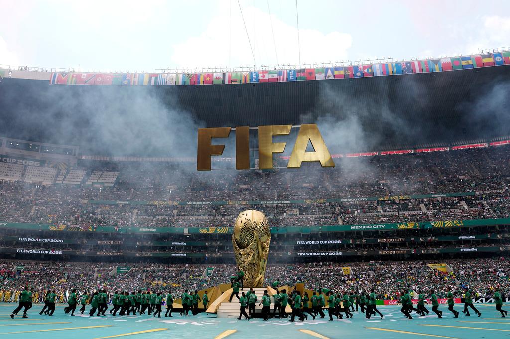A giant world trophy is displayed during the opening ceremony before the World Cup Group A soccer match between Mexico and South Africa in Mexico City, Thursday, June 11, 2026. (AP Photo/Eduardo Verdugo)