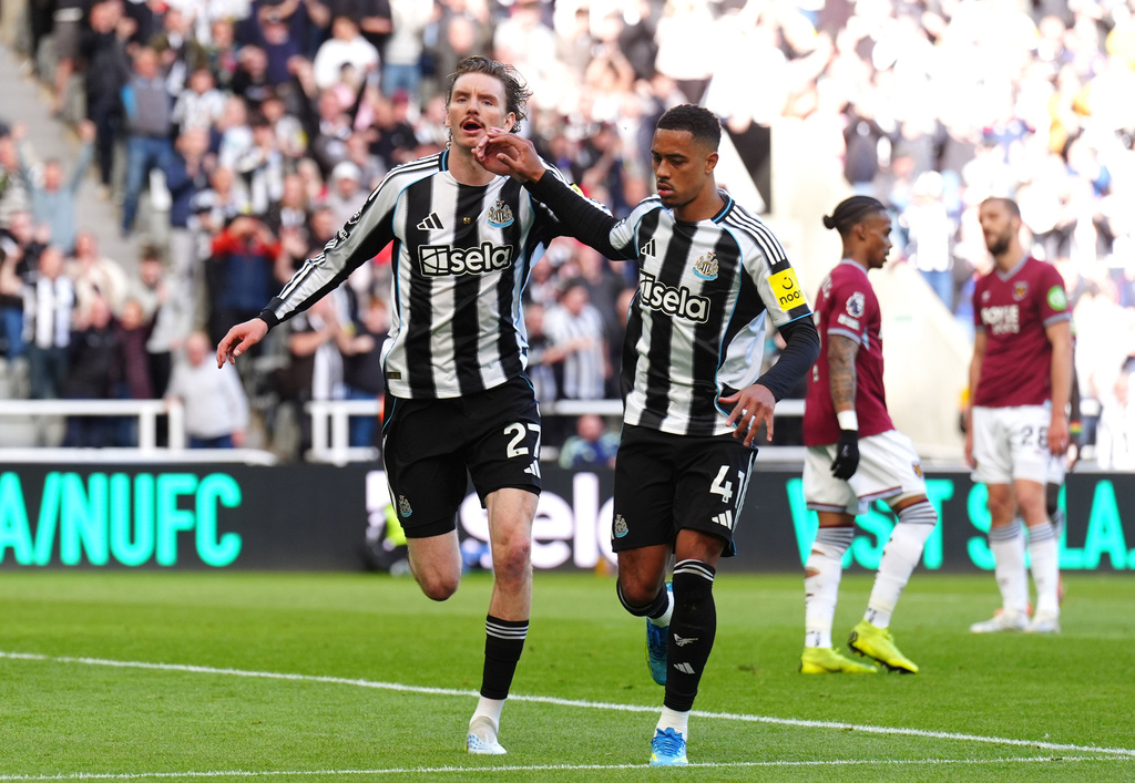 Newcastle United's Nick Woltemade celebrates scoring their side's first goal of the game during their English Premier League soccer match against West Ham United in Newcastle upon Tyne, England, Sunday, May 17, 2026. (Owen Humphreys/PA via AP)