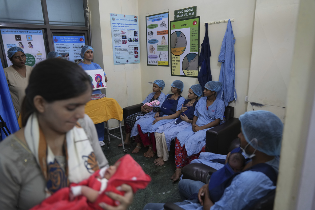 Nurses conduct a training for mothers whose newborns who were born premature or are sick in an intensive care unit of a government hospital in Gurugram, a satellite city of New Delhi, India, on Aug. 7, 2025. (AP Photo/Manish Swarup)