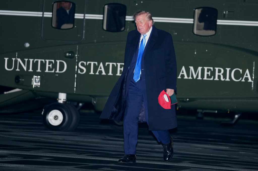 President Donald Trump arrives on Marine One on the South lawn at the White House, Sunday, Sept. 27, 2026, in Washington. (AP Photo/Allison Robbert)
