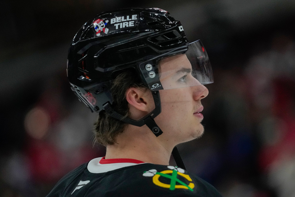 Chicago Blackhawks center Connor Bedard attends warmups before an NHL hockey game against the Washington Capitals, Friday, Jan. 9, 2026, in Chicago. (AP Photo/Erin Hooley)