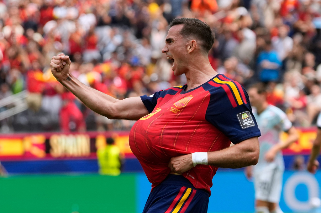 Spain's Fabian Ruiz (8) reacts after scoring the opening goal of his team during the World Cup quarterfinal soccer match between Spain and Belgium in Inglewood, Calif., near Los Angeles, Friday, July 10, 2026. (AP Photo/Andre Penner)