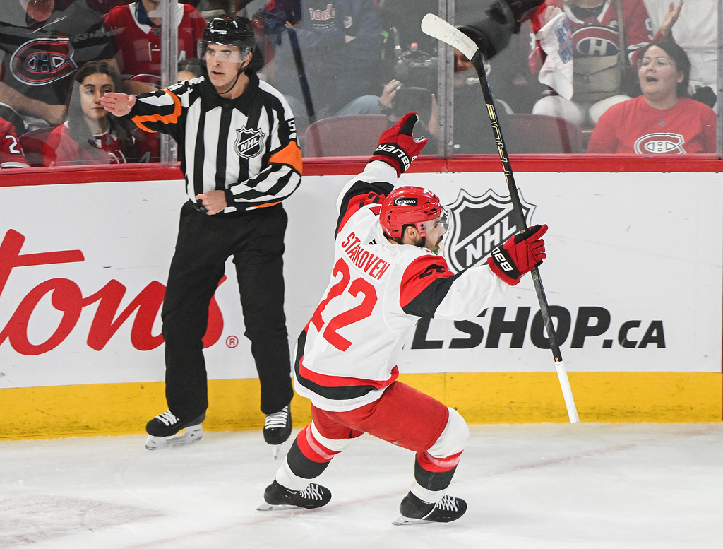 Carolina Hurricanes' Logan Stankoven (22) reacts after scoring against the Montreal Canadiens during the first period of Game 4 of NHL Eastern Conference final Stanley Cup playoff series action in Montreal, Quebec, Wednesday, May 27, 2026. (Graham Hughes/The Canadian Press via AP)