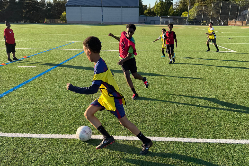 Children play in an African Youth Sports Academy soccer competition on Saturday, June 6, 2026, in Seattle, to help determine which participants would receive free World Cup tickets awarded to the organization. (Ali Abdulla via AP)