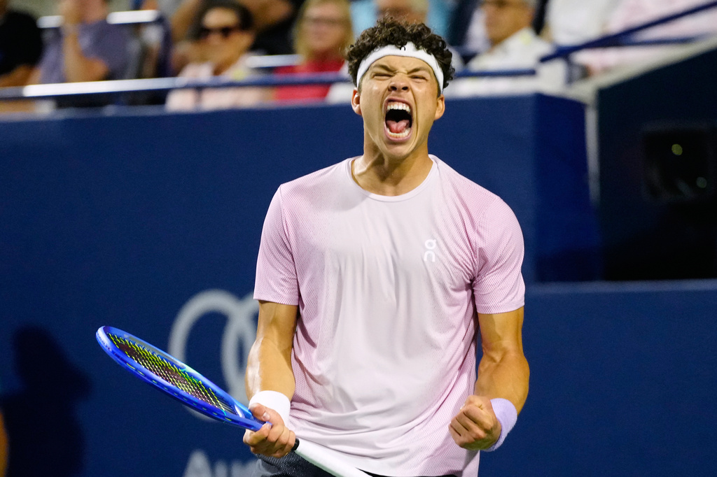 Ben Shelton, of the United States, celebrates after his win over Karen Khachanov, of Russia, in the final match at the National Bank Open men's tennis tournament in Toronto, Thursday, Aug. 7, 2025. (Frank Gunn/The Canadian Press via AP)