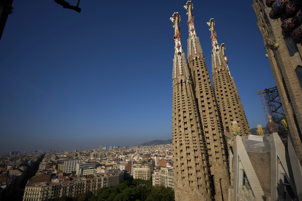 Partial view of the Sagrada Familia, during the presentation of the new central tower that will crown the Basilica, making it the largest Christian church in Europe, in Barcelona, Spain, Thursday, Sept. 18, 2025. (AP Photo/Emilio Morenatti)