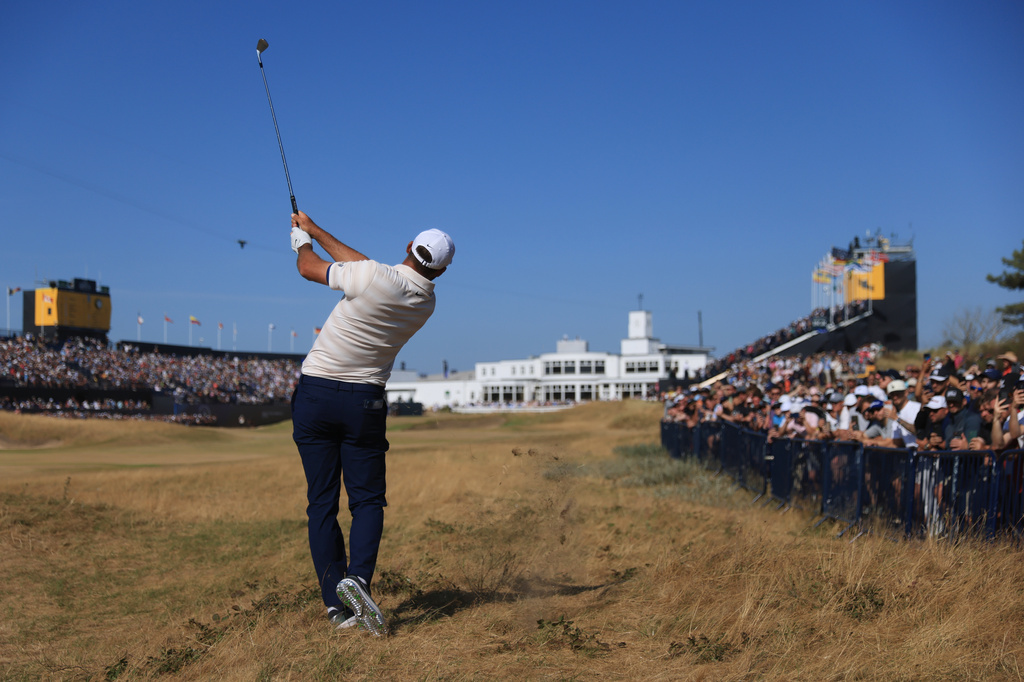Scottie Scheffler of the United States plays to the 18th green during the final day of the British Open Golf championships at Royal Birkdale golf club, in Southport, England, Sunday, July 19, 2026. (AP Photo/Peter Morrison)