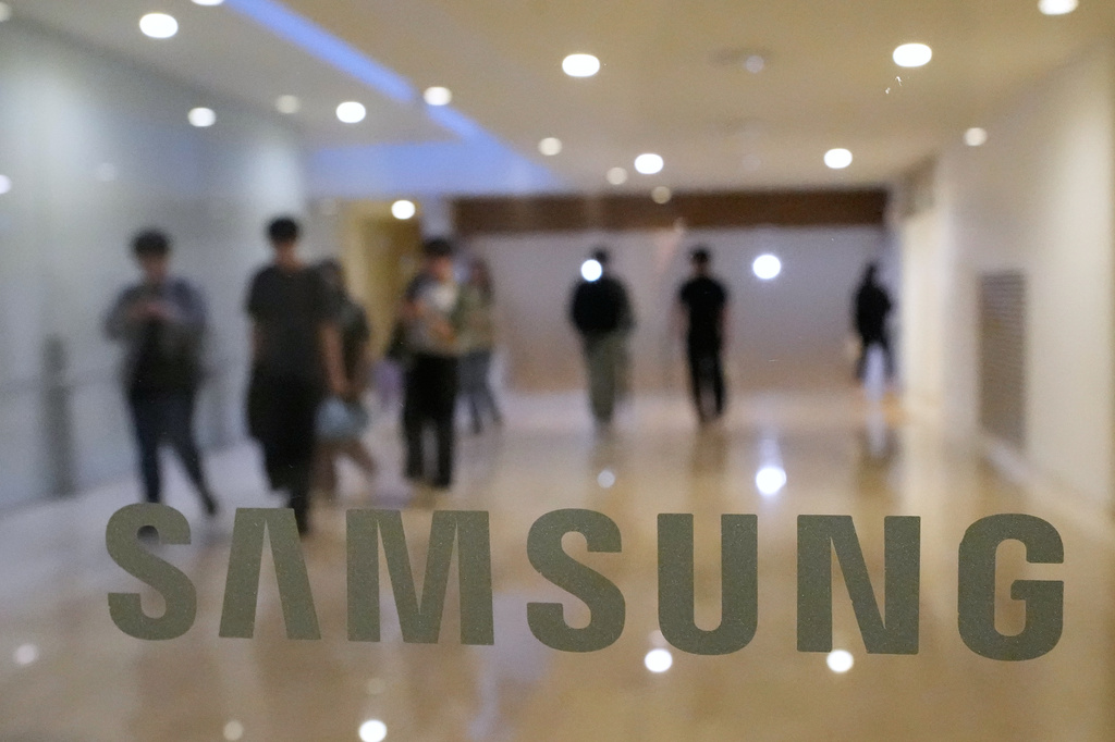 The logo of the Samsung Electronics Co. is seen at its office in Seoul, South Korea, Wednesday, May 20, 2026. (AP Photo/Ahn Young-joon)