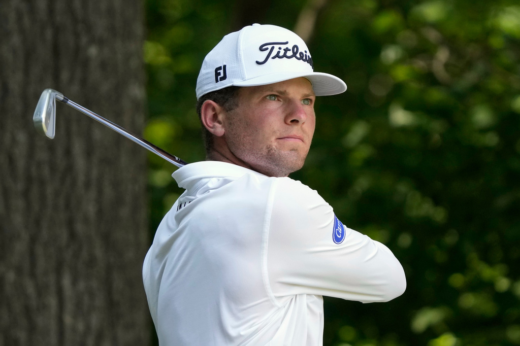 Michael Brennan watches his tee shot on the second hole during the final round of the Wyndham Championship golf tournament in Greensboro, N.C., Sunday, Aug. 9, 2026. (AP Photo/Chuck Burton)