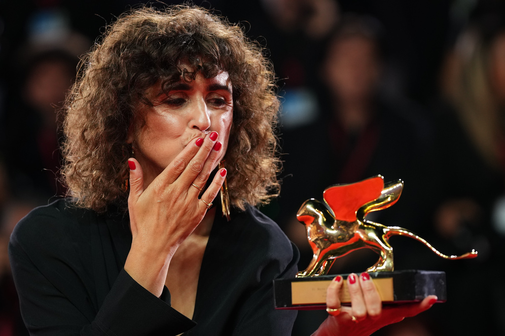 Director May el-Toukhy, winner of the Golden Lion for best film for 'Woman Unknown', poses for photographers at the awards photo call during the closing ceremony of the 83rd edition of the Venice Film Festival in Venice, Italy, on Saturday, Sept. 12, 2026. (Photo by Scott A Garfitt/Invision/AP)