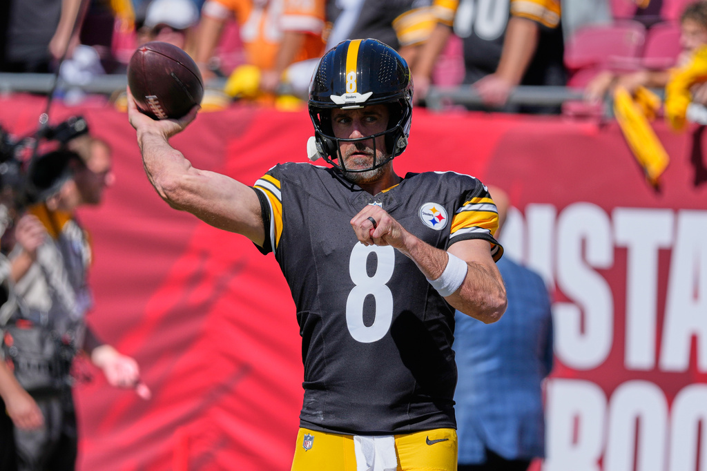 Pittsburgh Steelers quarterback Aaron Rodgers (8) aims a pass before an NFL football game against the Tampa Bay Buccaneers in Tampa, Fla., Sunday, Oct. 18, 2026. (AP Photo/John Raoux)