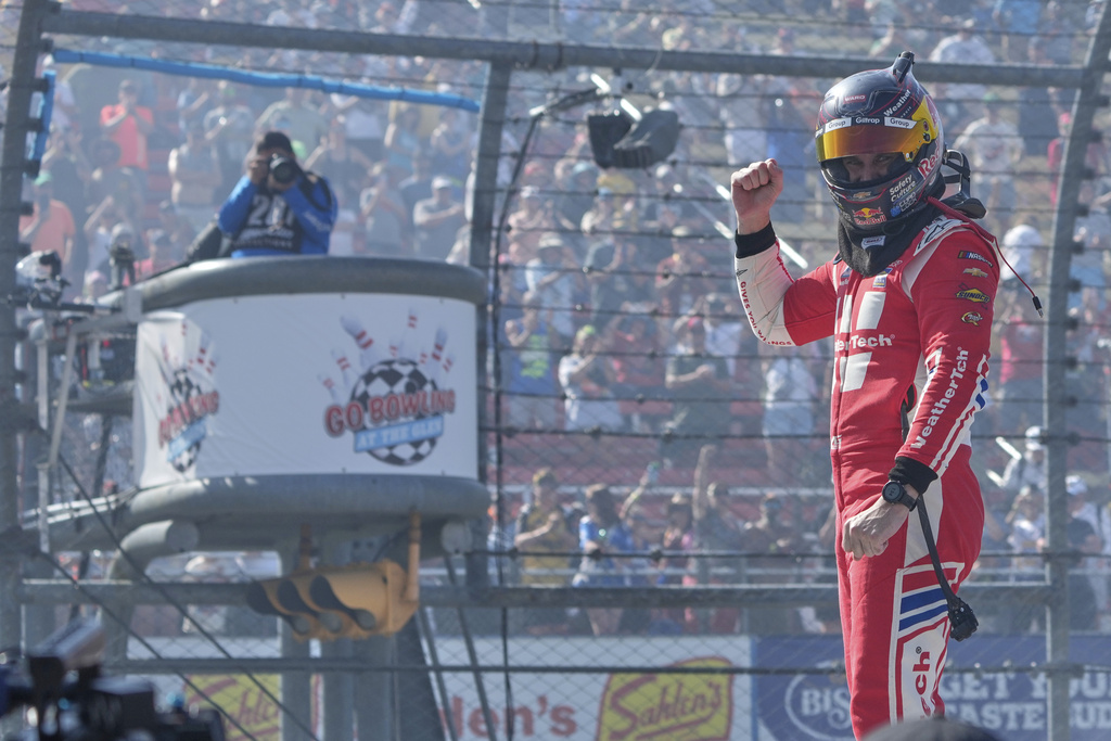 Shane van Gisbergen (88) reacts after finishing first during a NASCAR Cup Series auto race in Watkins Glen, N.Y., Sunday, Aug. 10, 2025. (AP Photo/Seth Wenig)