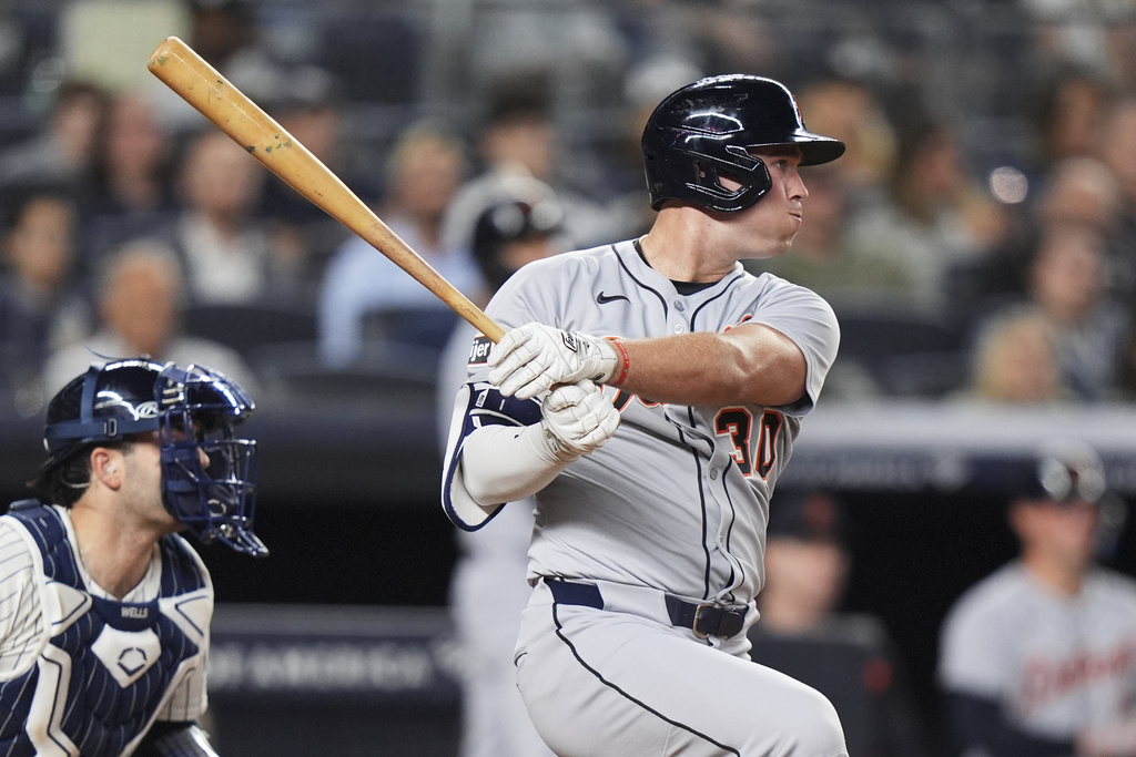 Detroit Tigers' Kerry Carpenter follows through on a two-run triple during the seventh inning of a baseball game against the New York Yankees Tuesday, Sept. 9, 2025, in New York. (AP Photo/Frank Franklin II)