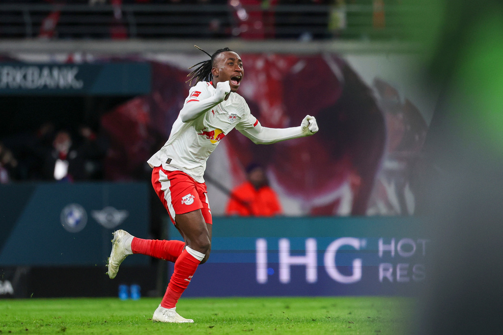 Leipzig's Yan Diomandé celebrates scoring during the Bundesliga soccer match between RB Leipzig and VfL Wolfsburg in Leipzig, Germany, Sunday Feb. 15, 2026. (Jan Woitas/dpa via AP)