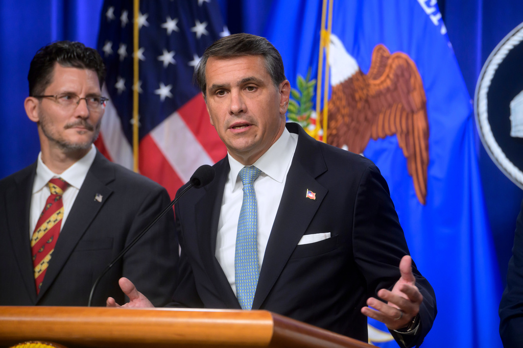 Acting Attorney General Todd Blanche, right, is joined by Deputy Assistant Secretary of the Department of State's Bureau of International Narcotics and Law Enforcement Affairs, Ambassador Michael C. Gonzales, left, during a news conference at the Department of Justice, Wednesday, August 5, 2026 in Washington. (AP Photo/Rod Lamkey, Jr.)
