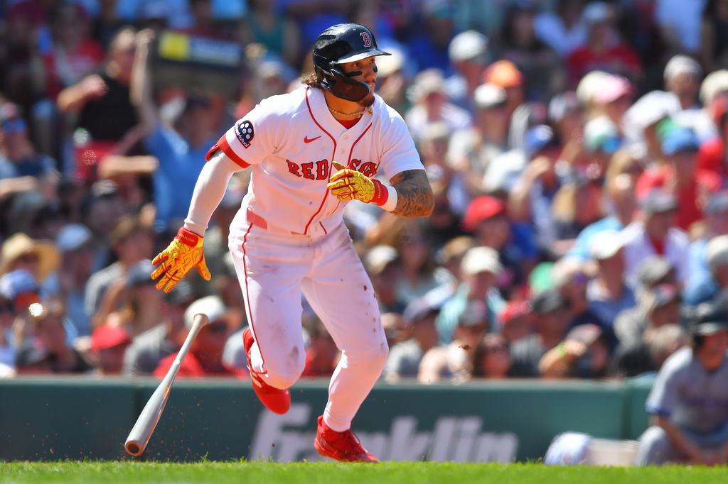 Boston Red Sox's Jarren Duran runs toward first base after hitting a two-run single in the fourth inning of a baseball game against the Toronto Blue Jays, Sunday, July 26, 2026, in Boston. (AP Photo/Steven Senne)
