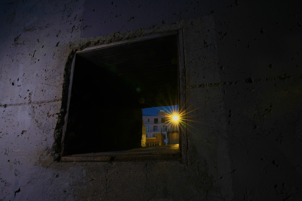 An embrasure is next to the U.N. buffer zone separating the Greek Cypriot south from the Turkish Cypriot north, established after the July 20, 1974 Turkish invasion of Cyprus, in the medieval core of the divided capital of Nicosia, Cyprus, on July 16, 2026. (AP Photo/Petros Karadjias)